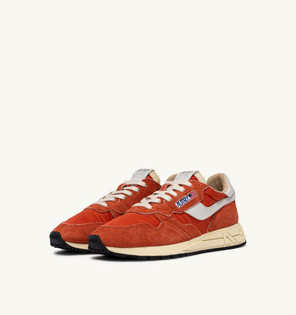 AUTRY Man REELWIND LOW SNEAKERS IN WHITE AND ORANGE RUST NYLON AND SUEDE