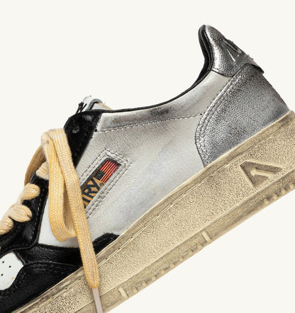 AUTRY Man MEDALIST LOW SUPER VINTAGE SNEAKERS IN WHITE BLACK AND SILVER LEATHER