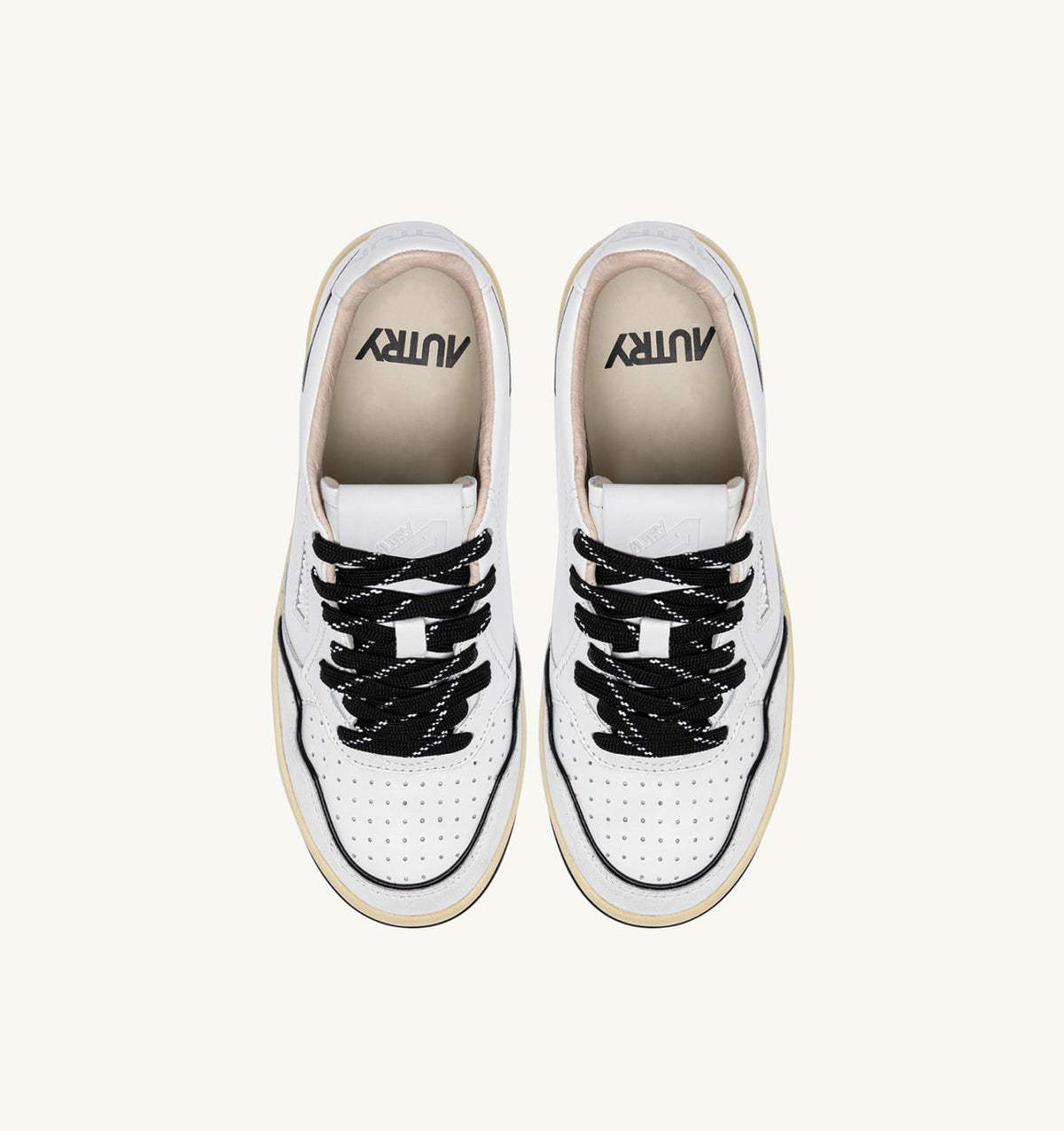 AUTRY Woman GOLF LOW SNEAKERS IN WHITE AND BLACK LEATHER